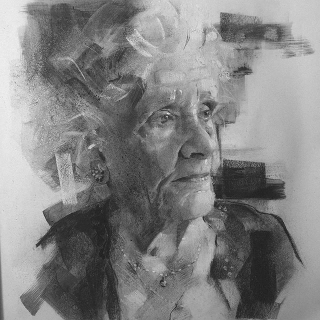 Charcoal drawing commissioned portrait of a family member in black and white by artist James Thomas